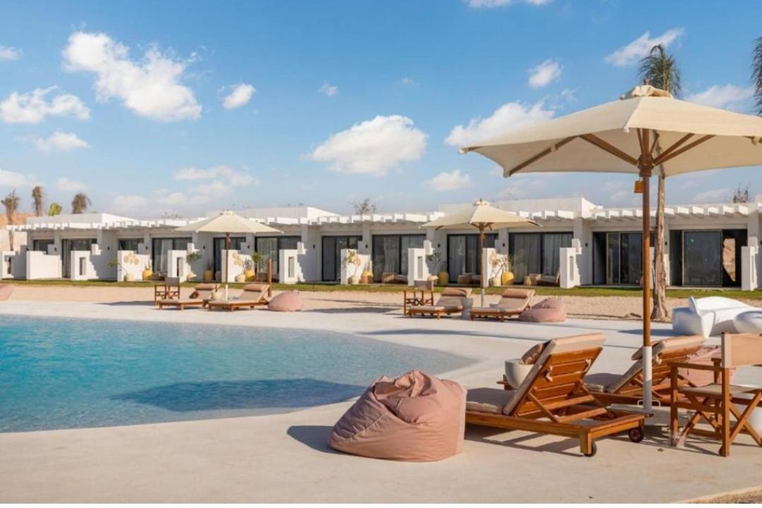 Hotel D-Bay North Coast à Zawiyat 'abd al Mun'im Extérieur photo